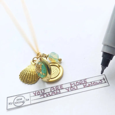 Pangea Seashell Locket Necklace